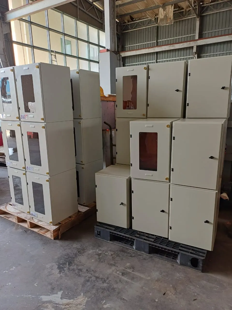 Fabricated electrical cabinets packed and palletised for delivery.