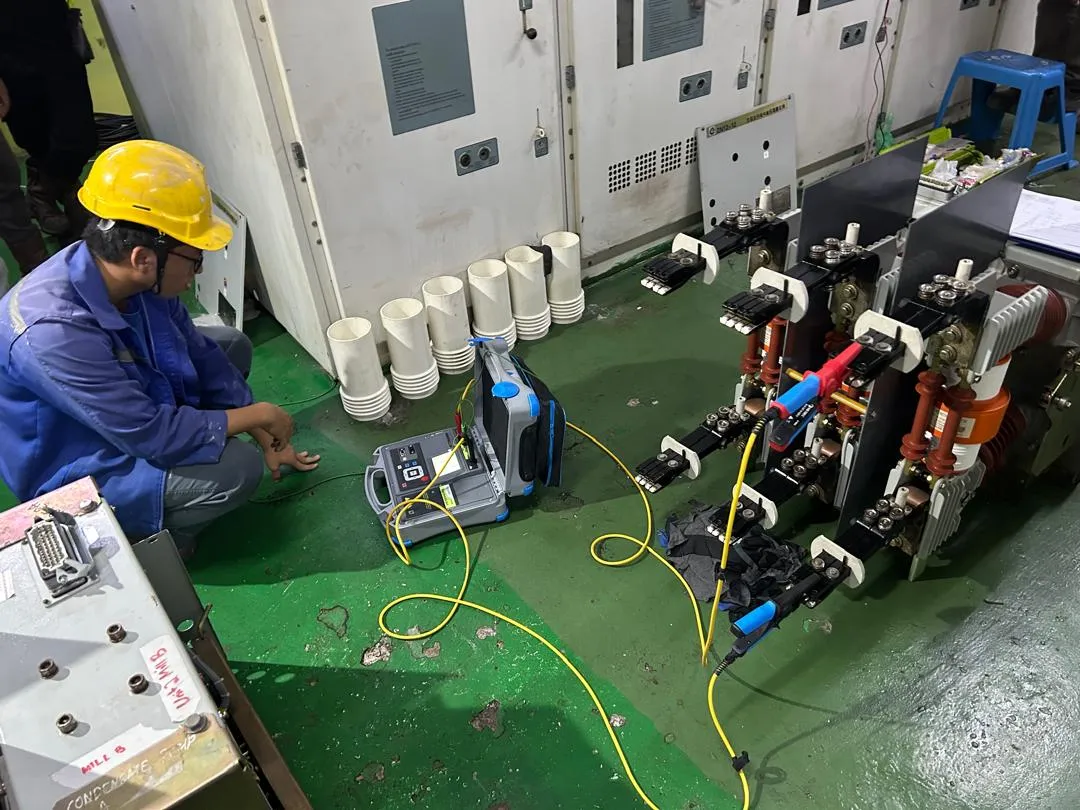 A vacuum contactor being serviced and tested.