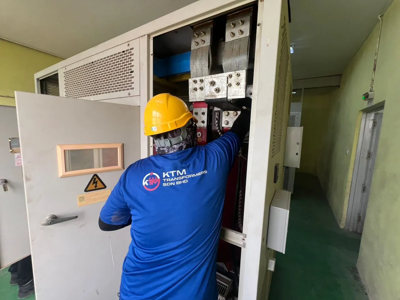 Cable connections inside a dry-type transformer enclosure.