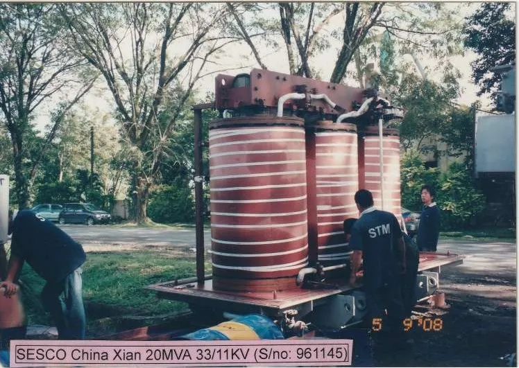 Windings of a SESCO China Xian 20MVA 33/11kV transformer being worked on outdoors.