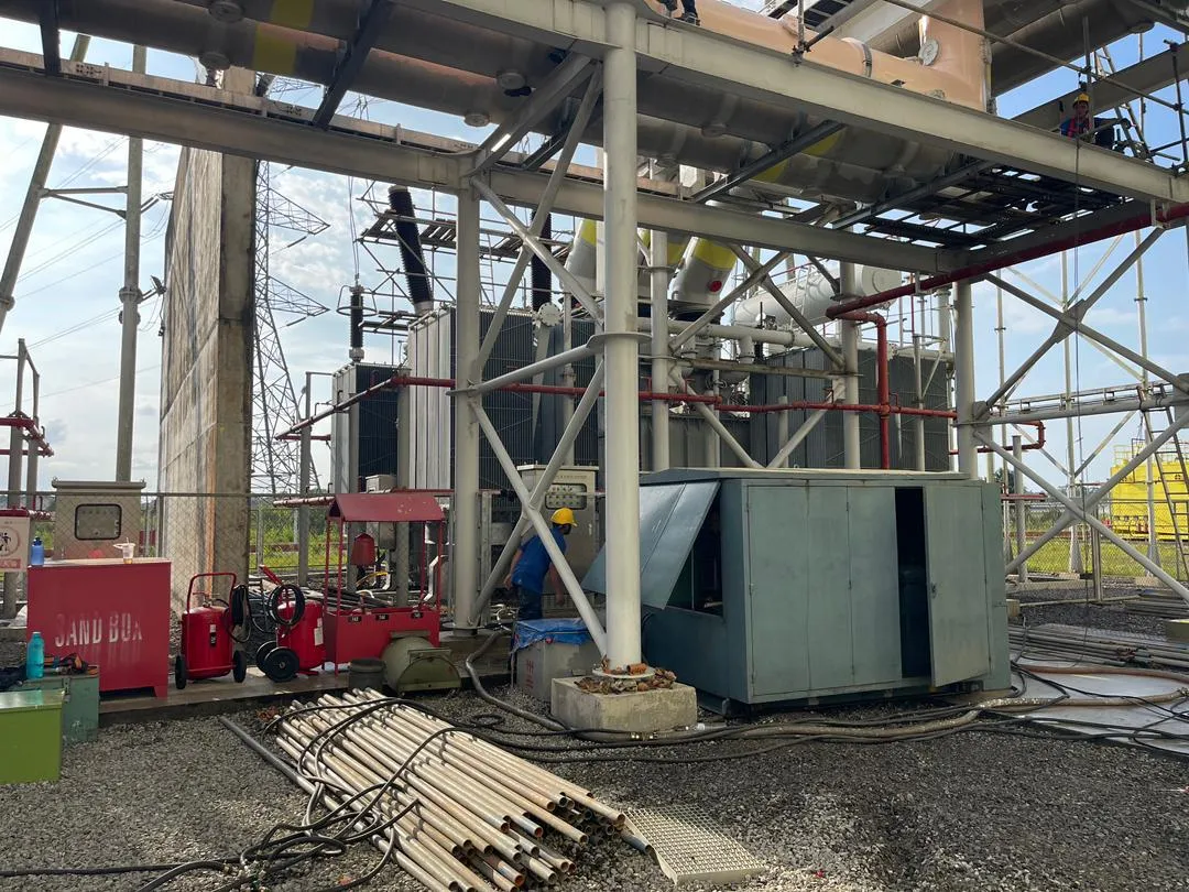 Transformer oil purification plant set up beside a substation transformer.