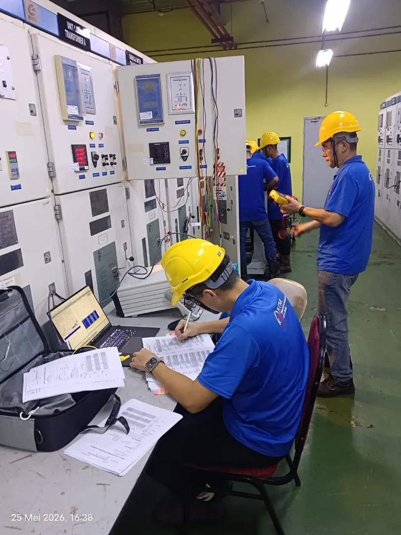 Protection relay testing and calibration in a substation control room.