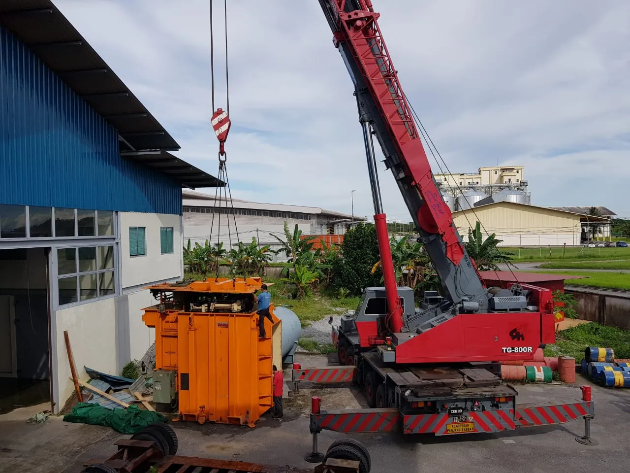 A transformer being lifted for transportation.